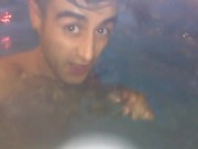 Twink tries hydromassage nozzle on his uncut cock in public pool underwater