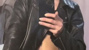 Black leather jacket + jeans + smoking = domination