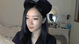 Sexy police officer cosplayer strips and dances on cam