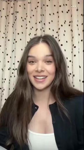 Hailee Steinfeld shows off her beautiful celebrity body in a tank top, displayin