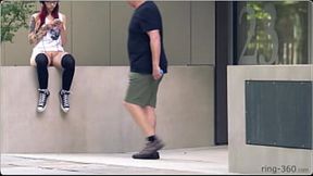 Dark-haired beauty rides skateboard &mdash;  showing off in the streets