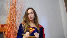 Hot babe in supeman outfit masturbates hard