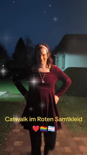 Catwalk in red velvet dress.