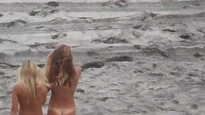 Blonde babes with big tits caught nude in seaside voyeur video