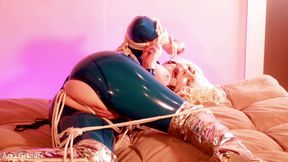 Latex bondage escape, sexy MILF submissive in rubber with gag