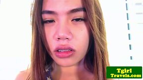 Asian ladyboy with braces dildo fucks her asshole