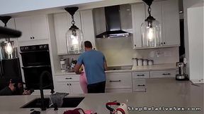 Dude fucks busty stepsister in the kitchen behind the scenes