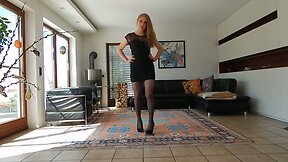 Crossdresser wears a black prom dress