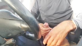 Hot guy jacks off and spits big cock in public car