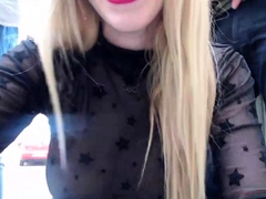 Blonde teen girl playing on webcam