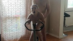 coquette in leggings gets fucked doggy style on the exercise bike