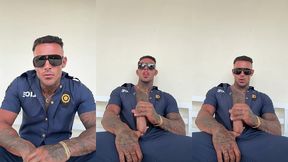 a man in police officer cosplay jerks off