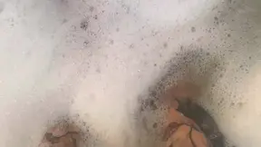 Rubbing tons of lotion and oil over my tattooed feet and huge tits then ride my huge dildo