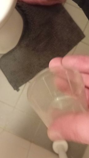 Cumshot in plastic cup