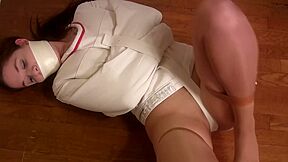 Tara Tied frogtied and tape gagged in a Posey straitjacket