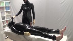 Mrs. Dominatrix and her experiments on a slave. 2 angle