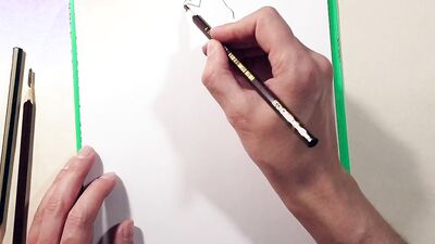 Close-up footage of a chap paining some ass cheeks