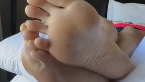 Sun-kissed soles and yellow toe nails