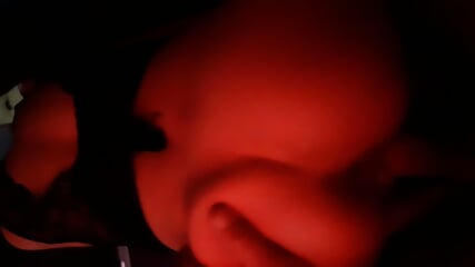 Brunette fucking slut deepthroats in red light