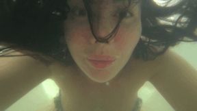 Blowing bubbles underwater in the bathtub Bc