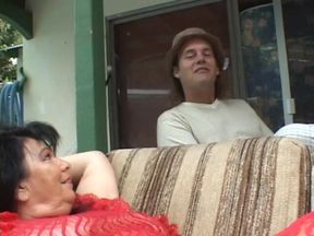 MILF with huge breasts rides a big cock outside