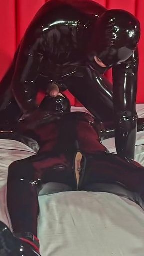 Latex Slave: Tied up on Bed - Alex Latex