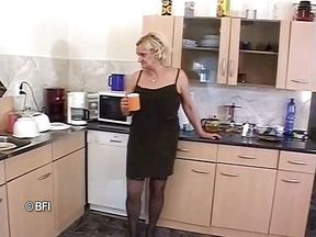 Granny with big breasts feels male pole inside her hairy pussy