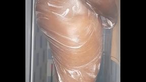 African giant fingering his tight anus while bathing