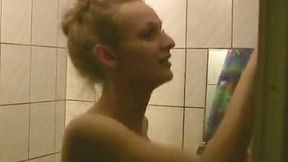 Natural ugly blonde hasn't found a better place to pee than bath tub