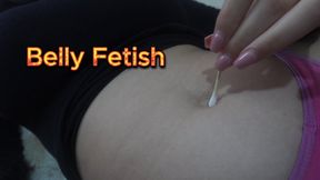 Latina stepsister cleaning belly button with a cotton swab and then after cleaning it she starts playing with her belly