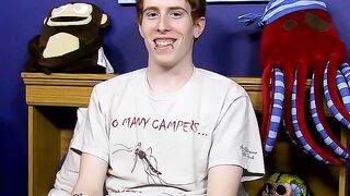Guy with red hair gets interviewed before a solo session