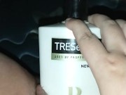 Bunni Stretching with thick conditioner bottle