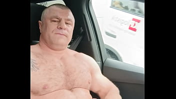 Tattooed Muscle Daddy Dante Strips and Jerks a Huge Load While Driving