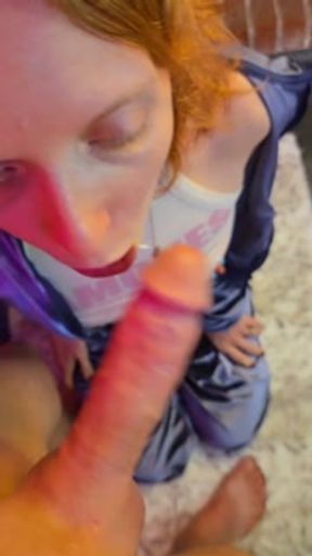 Chained to the wall and on her knees ready to suck