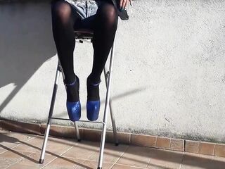 Denim shorts, ebony tights and glamorous 8 inch heels