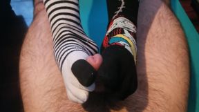 Horny Milf Gives Neighbor A Sockjob Until He Cums On Her Feet