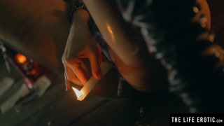 Sexy brunette squirting as she fucks herself with a lit candle