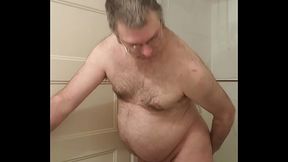 Nude Martin Lavall&eacute_e sodomizes himself and compares his dildo with his small caged penis afterwards