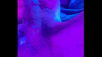 My artisic cumshot under pink and cyan lights