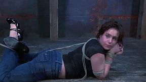 Perverted red haired chick ties up sex-slaved right on the cold floor