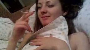 Cute brunette girlfriend smokes in my bed and blows me in the morning