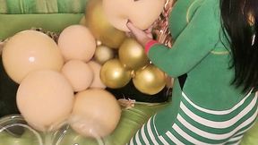 Christmas is here and I put on some quirky pajamas to pop these balloons