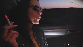 Two cigarettes back to back in the car