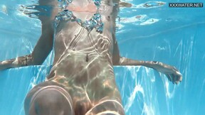 Euro blonde tiny tits pornstar Zazie swimming naked