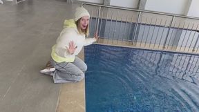 Wetlook in winter outfit in the pool!