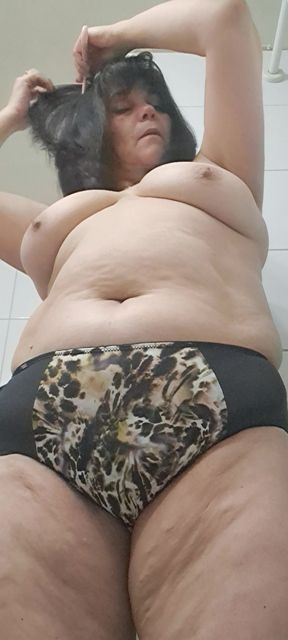 Milf pulling down her panties showing her hairy pussy and ends up brushing her teeth, part 2