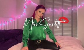 Scarlett's emerald satin blouse and leather pants tease