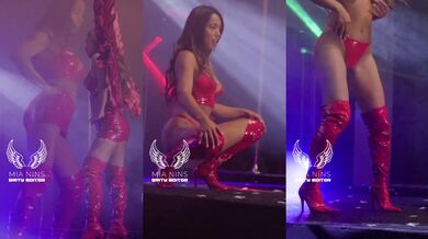 latina in latex strips on stage on new music