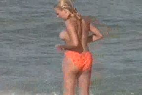 Topless girls on the French nudist beach got caught on my cam