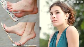 Elisa's shiny flip flops shoe dangling - 13060